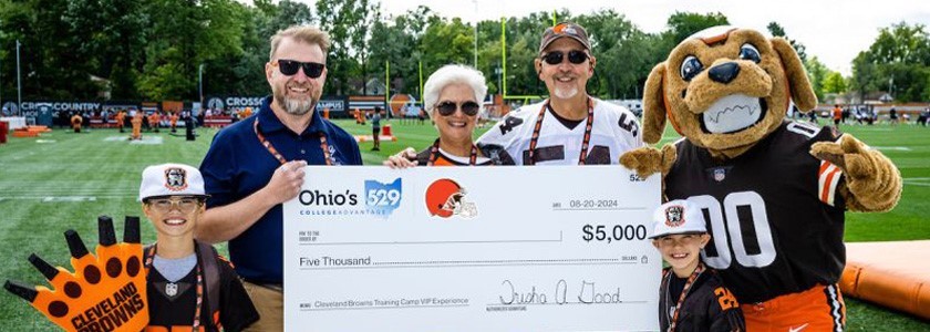 Cleveland Browns fans receive oversized college savings check from Ohio 529 and Chomps