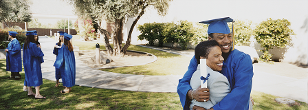 Son hugs his mother at his graduation ceremony