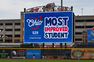 Logos of Ohio 529 and RubberDucks Most Improved Student on Jumbotron Jumbotron image of the logos of Ohio 529 and Most Improved Student